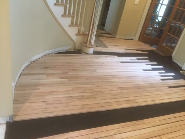 Laying Out Wood Planks in a Foyer